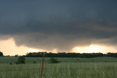 Wall cloud with clear slot wrapping in.